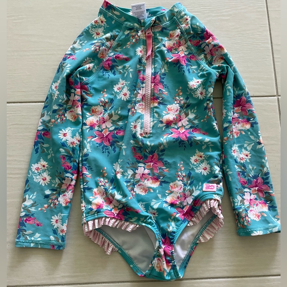 RuffleButts Floral one-piece long sleeve swimsuit
